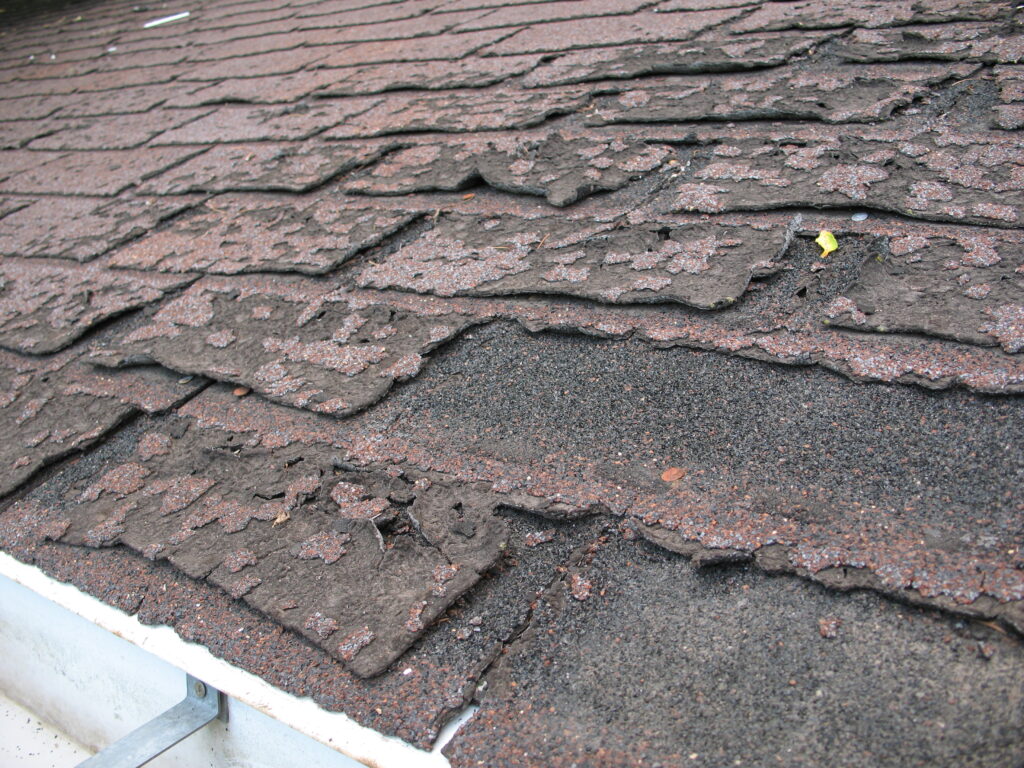 decayed asphalt shingles