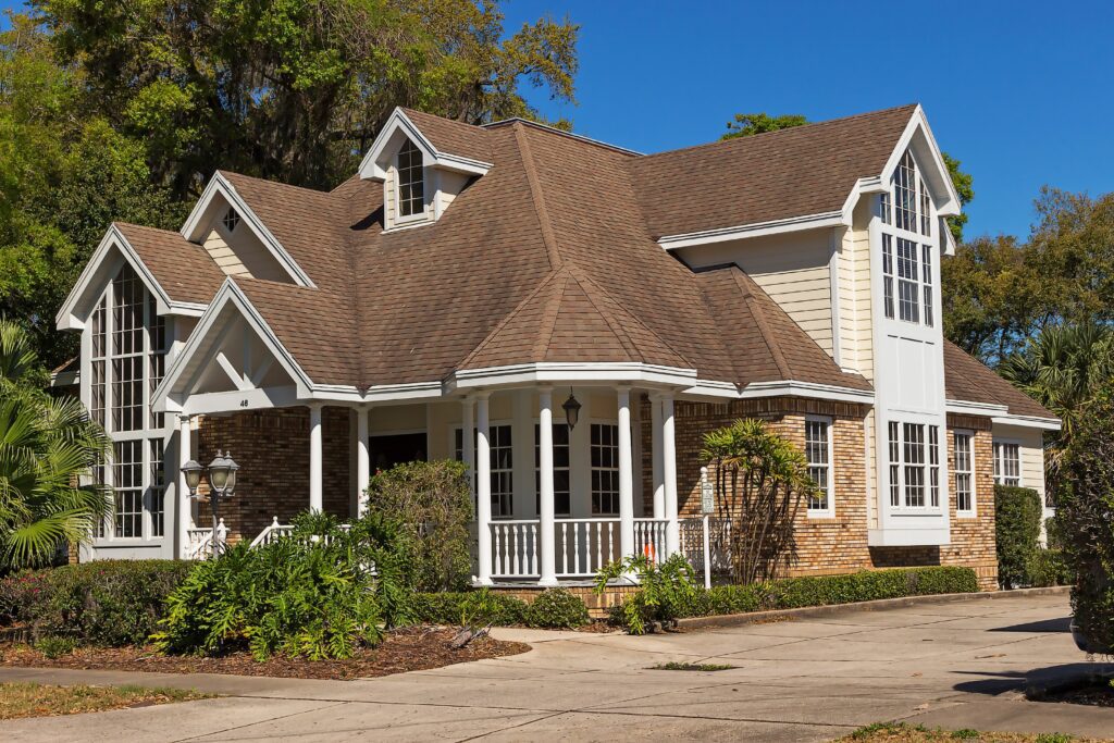 house with brown shingled roof