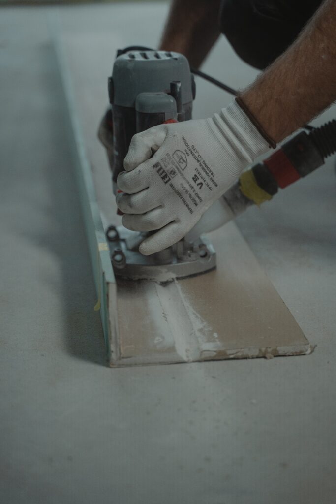 contractor sanding counter