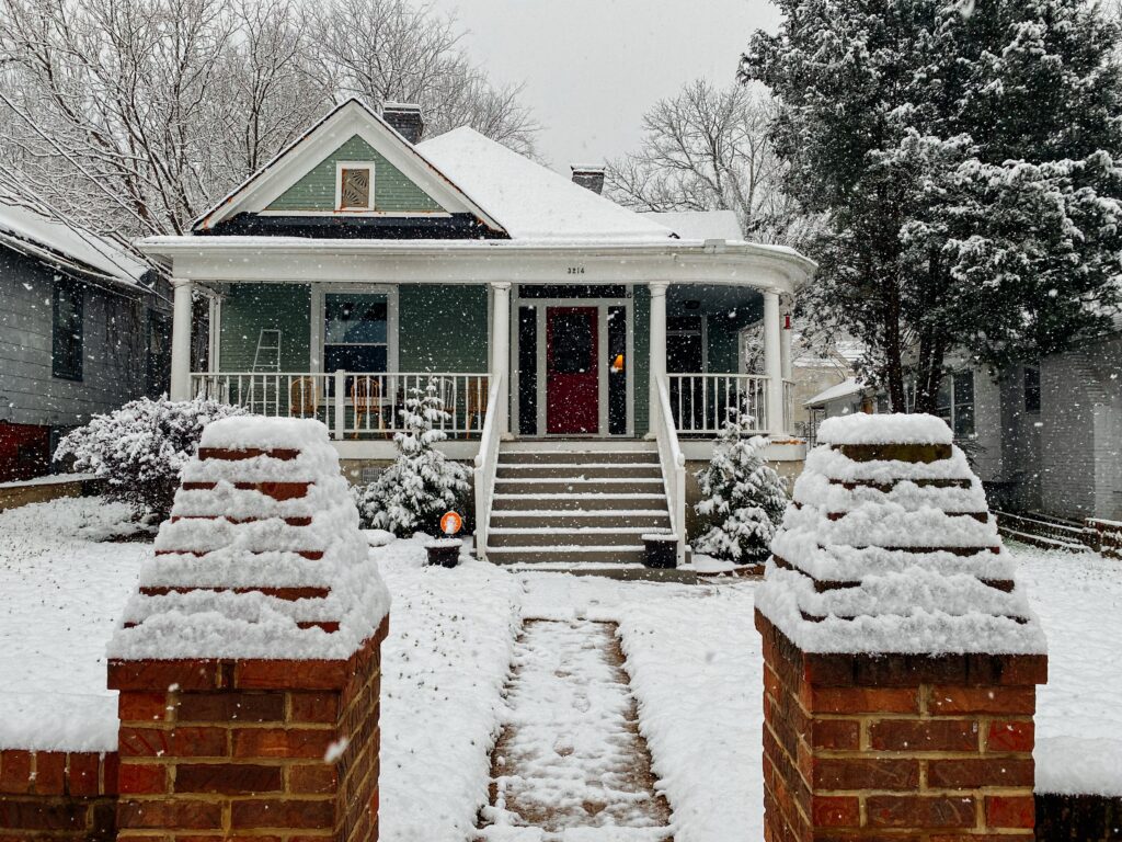 snow on home's roof