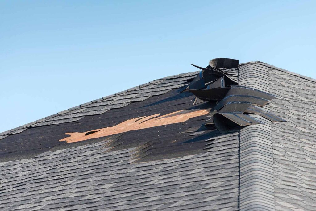 Roof damage on asphalt shingled roof