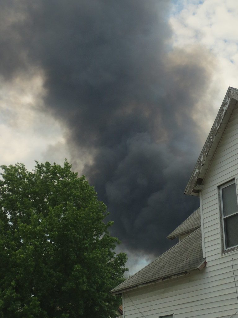 dark smoke over residential home