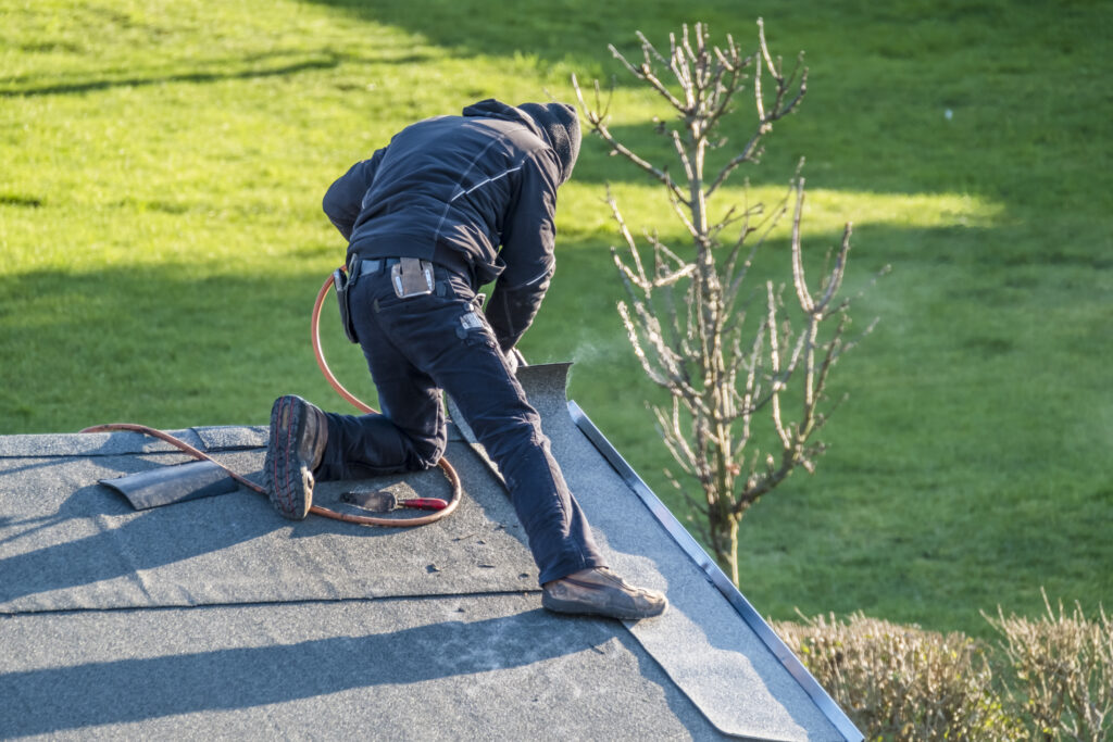 Roofer worker gas burner for maintenance