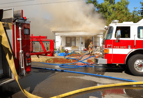 firefighters fighting smoky blaze