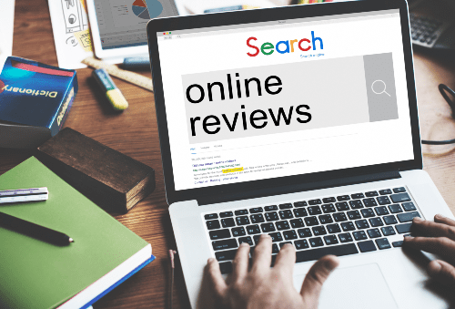 online reviews written on computer