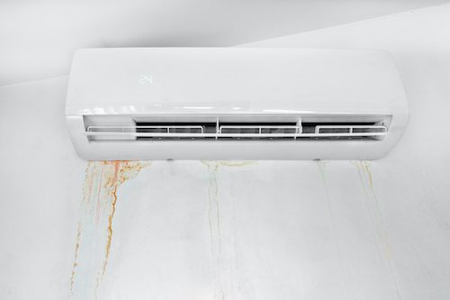 Wall with mold stain due to air conditioner leakage